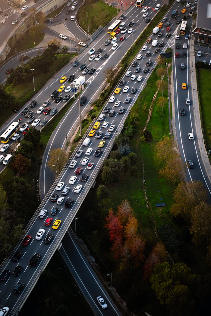Aerial view captures bustling Istanbul highway traffic during rush hour.